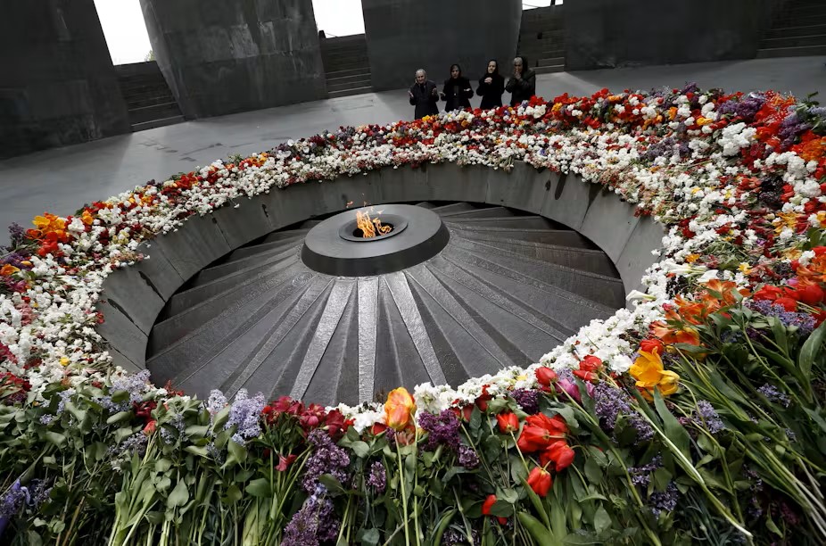 A circular staircase with flowers around it